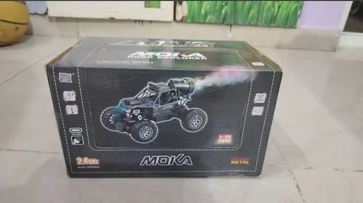 Remote control off-road monster truck with smoke spray effect